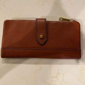 Fossil brown leather wallet with snap closure